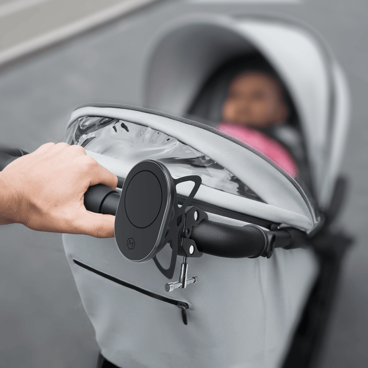 Close-up of the magnetic phone mount with adjustable clamp, designed for secure attachment to bike handlebars, with detailed dimensions.