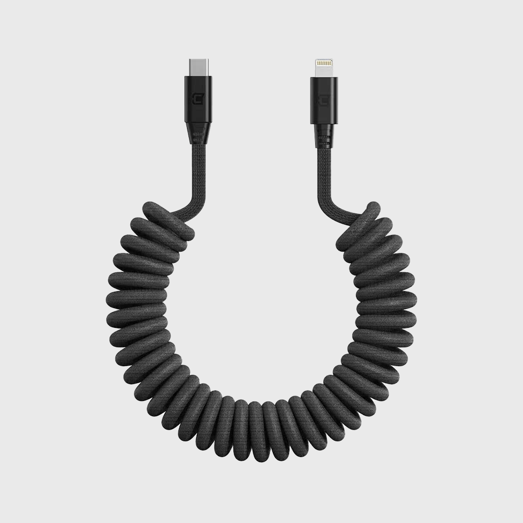 Black coiled USB-C to Lightning cable with reinforced strain relief, designed for Apple devices, 1 meter length, on a white background