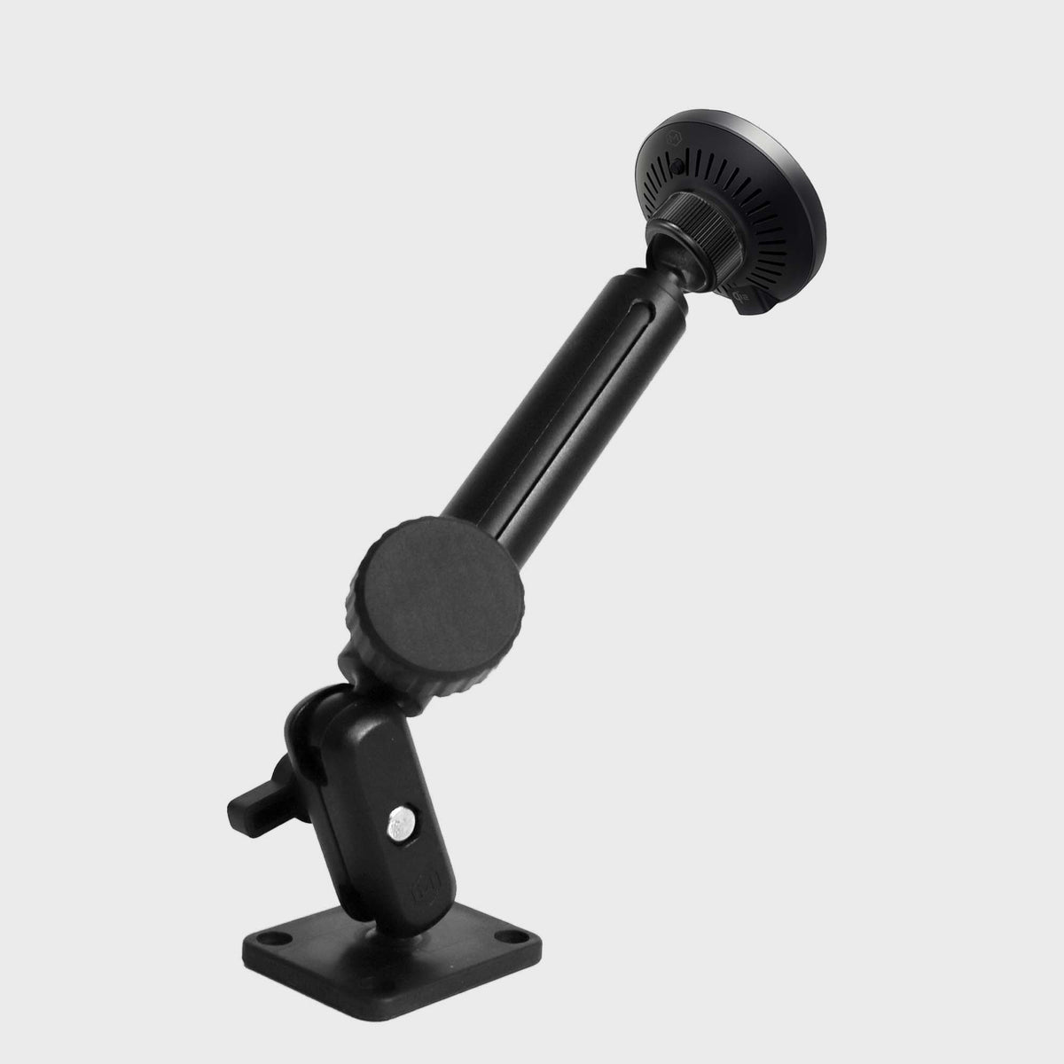 Adjustable industrial mount with a black knob, supporting the magnetic wireless car charger, mounted on a sturdy base for work vans
